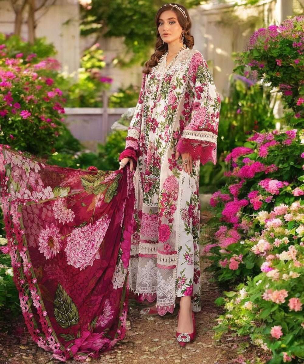 Maria B white and pink embroidered 3PC organza suit with elegant festive design.