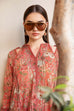 1002: Peach printed 3-piece unstitched lawn suit with embroidered shirt and chiffon dupatta.