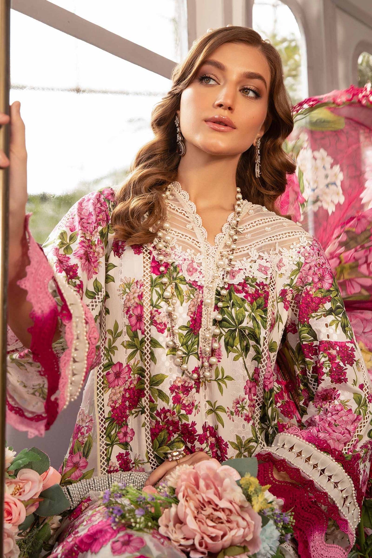Maria B white and pink embroidered 3PC organza suit with elegant festive design.