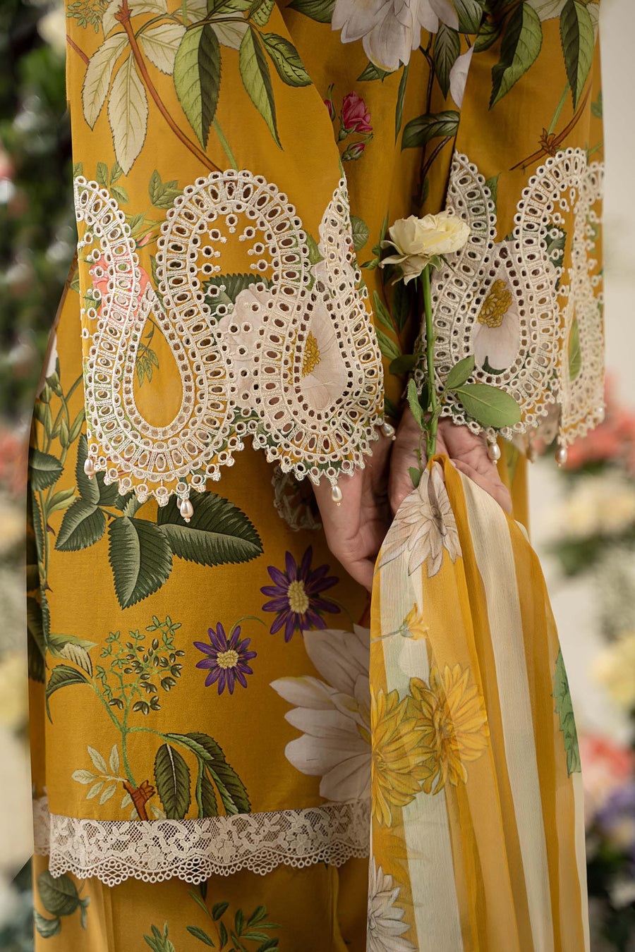 Maria B MP25-04B 3-piece unstitched printed lawn suit with chiffon dupatta and cambric trousers.