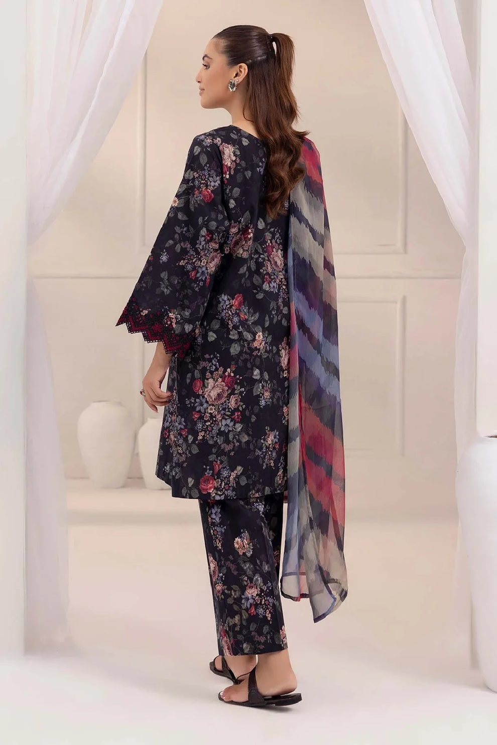 Maria B style chikankari lawn suit with printed chiffon dupatta and embroidered patches.