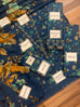 IZnik Zinc Printed Lawn 2025 unstitched 3-piece suit with embroidered lawn front, printed lawn dupatta with lace, and printed cotton trouser.